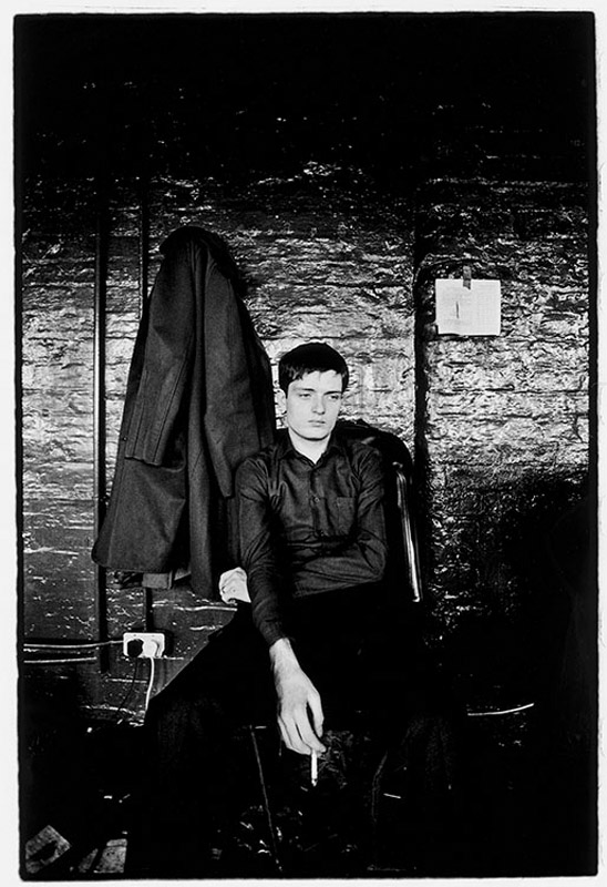 British singer Ian Curtis of post-punk band Joy Division, photographed at TJ Davidsons rehearsal room, Little Peter Street, Manchester, August 19, 1979.