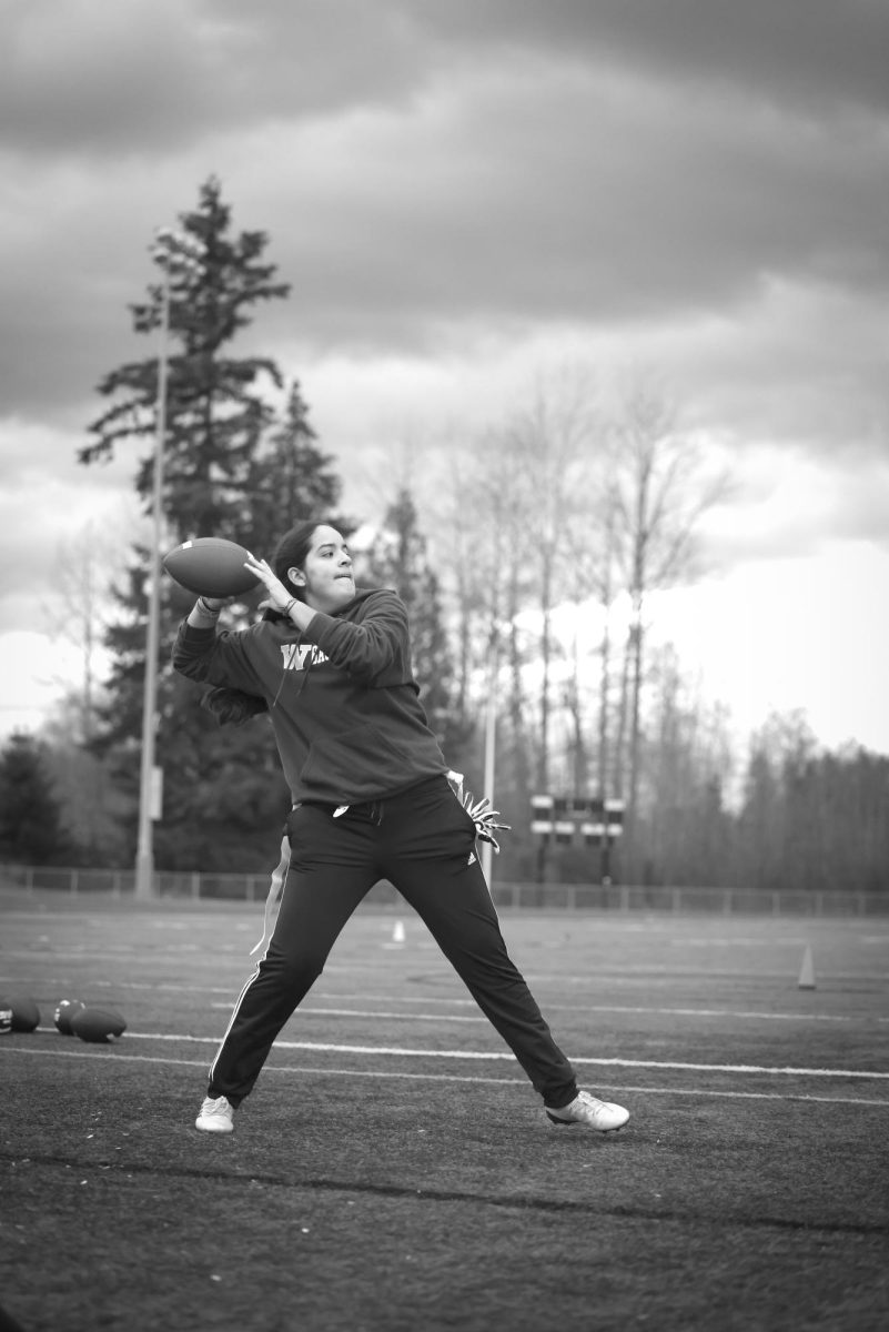 Junior Sofia Gomez-
Salas throws during a
preseason flag football
practice. The team has
increased its size and its
schedule for the 2025
season.